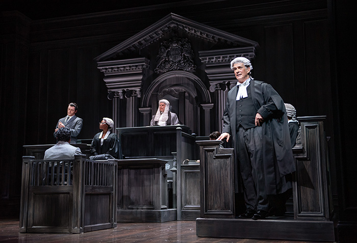 Patrick Galligan as Sir Wilfrid Robarts, QC, with the cast. Photo by Emily Cooper.