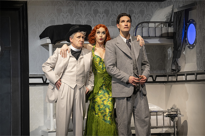 Michael Therriault as Moonface Martin, Kristi Frank as Erma Latour and Jeff Irving as Billy Crocker (Shaw Festival, 2025). Photo by David Cooper.