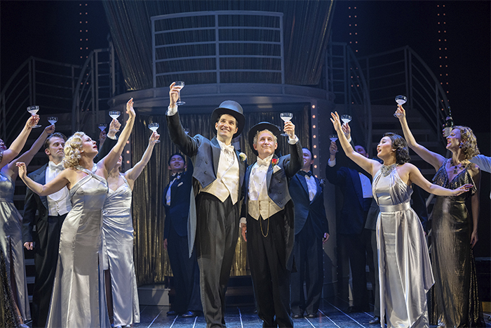 Jeff Irving as Billy Crocker and Michael Therriault as Moonface Martin with the cast of Anything Goes (Shaw Festival, 2025). Photo by David Cooper.